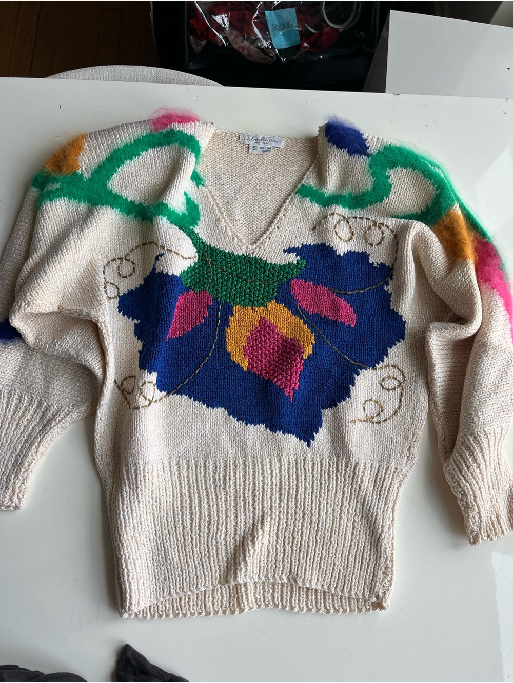 Cream V-Neck Sweater with Multicolor Abstract Floral Motif